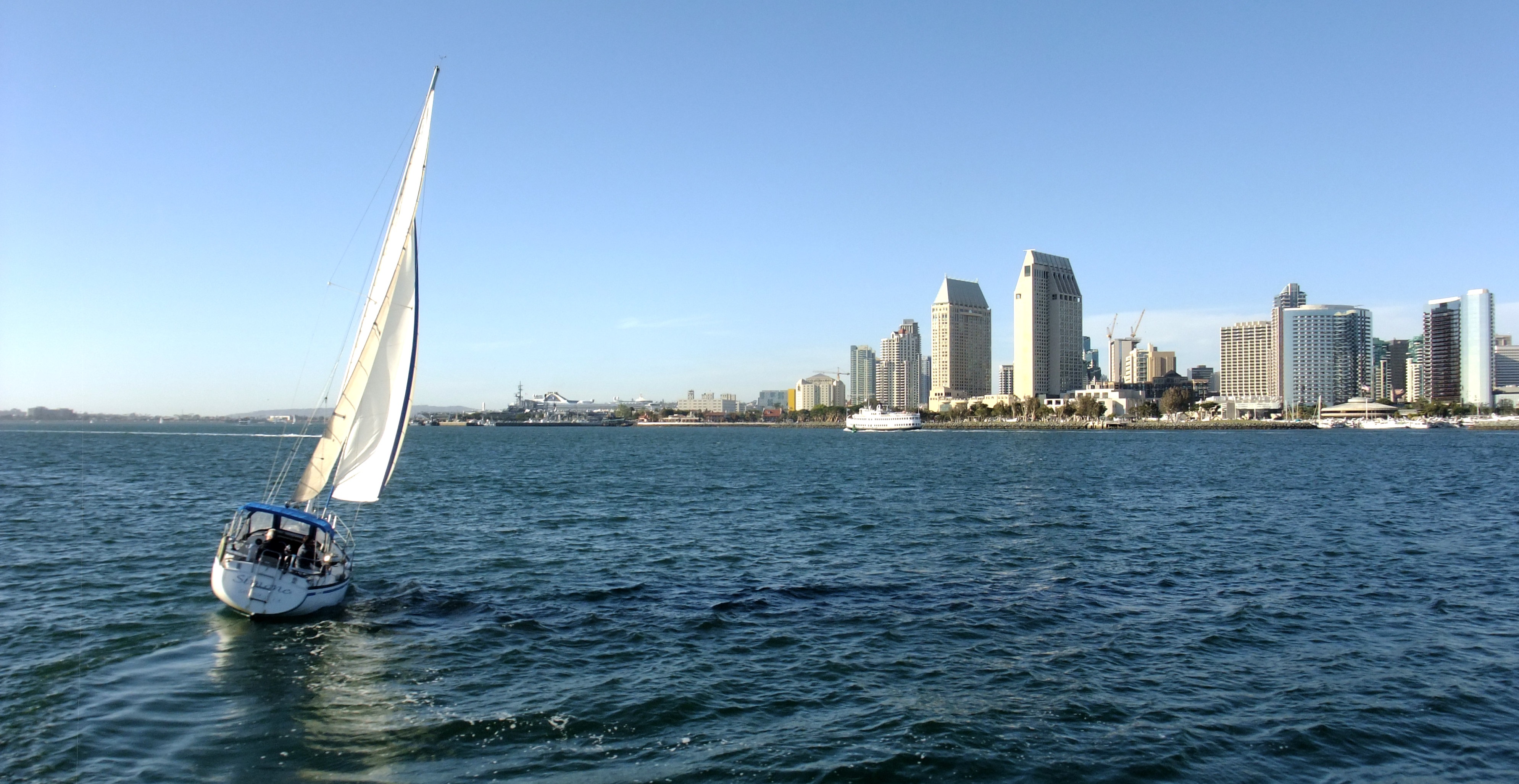 Boat with San Diego Skyline Behind